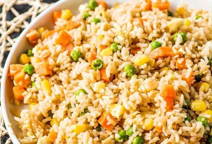 Bowl of simple 10-minute egg fried rice with vegetables