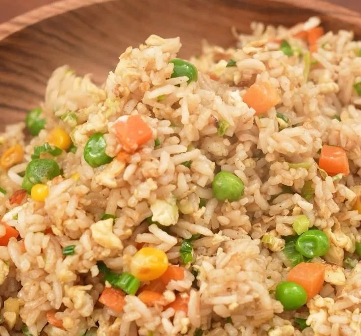 Authentic egg fried rice dish prepared at home, featured in a cooking video