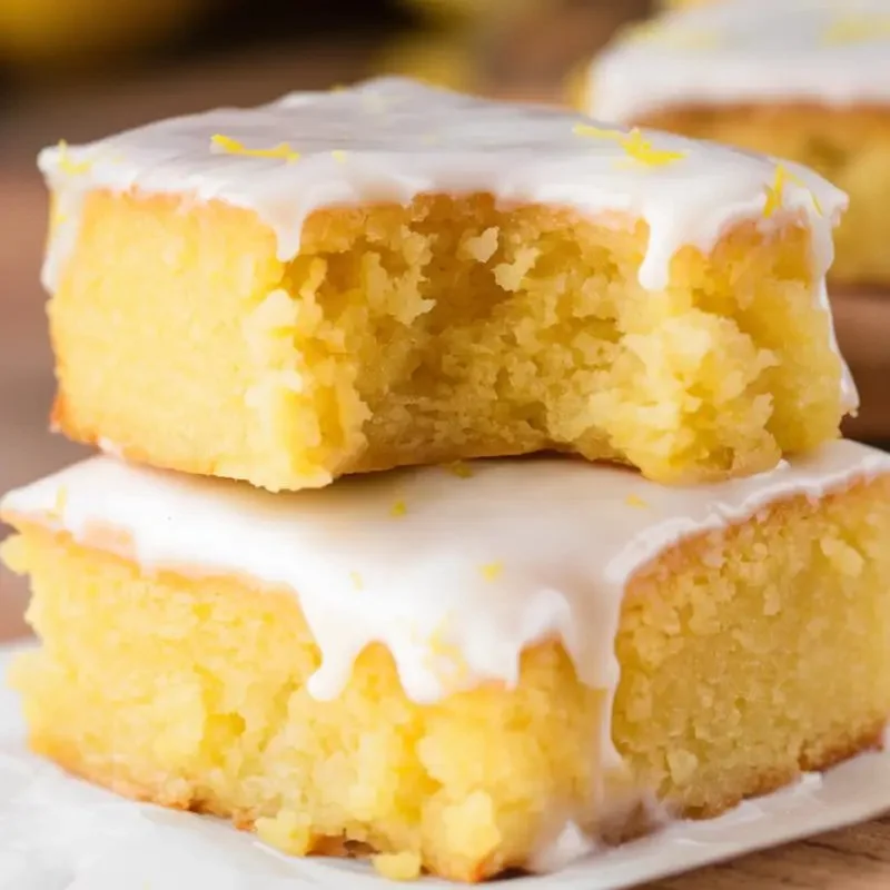 Deliciously soft and chewy lemon brownies topped with lemon glaze