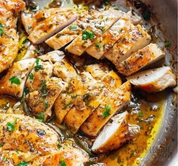 Garlic Butter Chicken served with herbs and spices for a flavorful meal