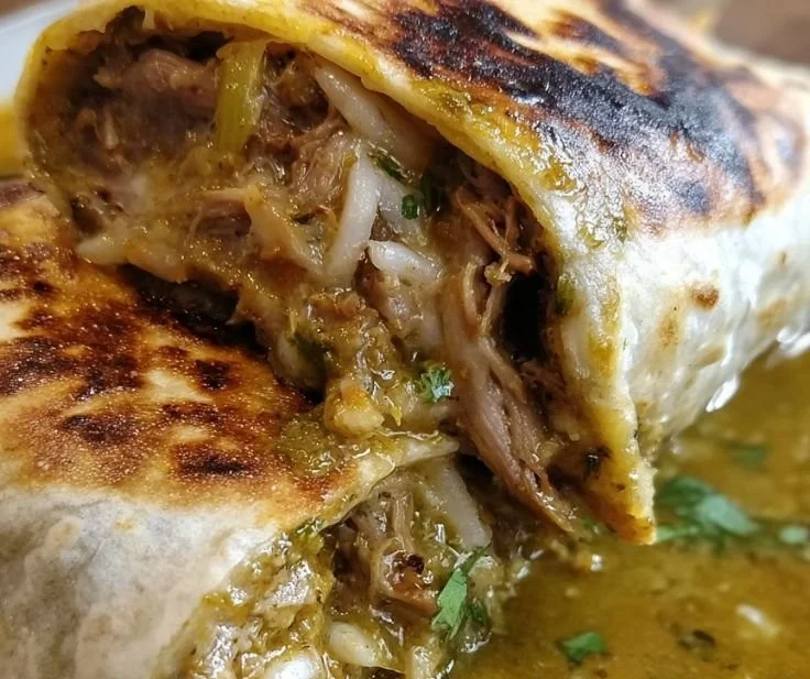Delicious Green Chili Hatch Burritos ready to serve with fresh ingredients.
