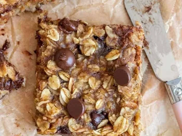 Homemade Banana Oatmeal Bars with sliced bananas and oats