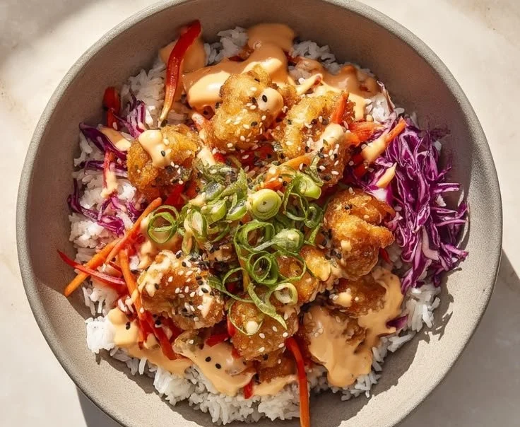 Delicious Bang Bang Chicken Bowl served with fresh ingredients and vibrant colors.