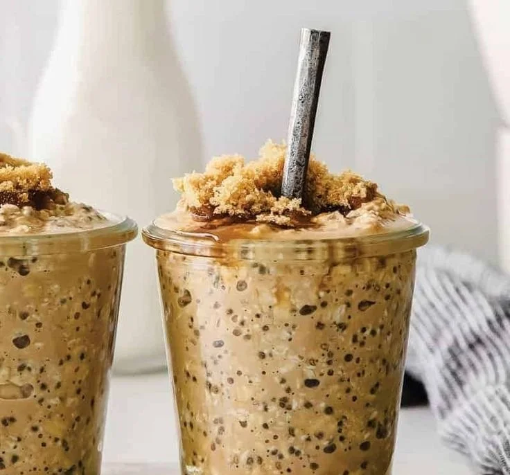 Brown Sugar Shaken Espresso Overnight Oats in a jar with a spoon