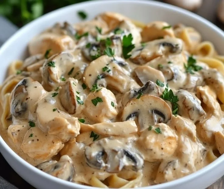 Delicious chicken stroganoff with mushrooms prepared in a pressure cooker