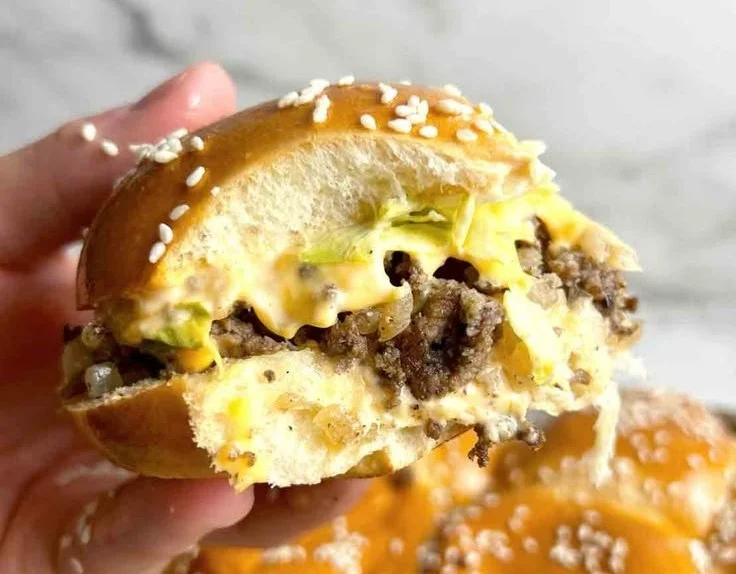 Delicious homemade Big Mac sliders on a platter for a perfect party snack.
