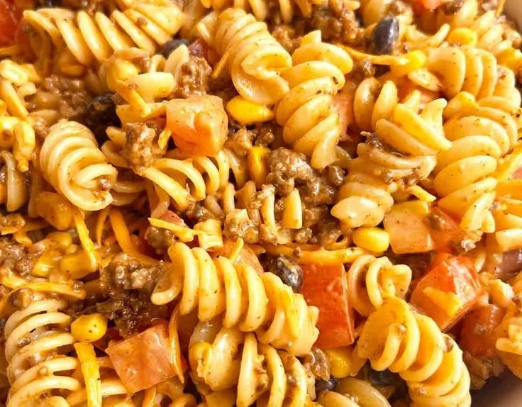 Delicious easy taco pasta salad with colorful ingredients in a bowl