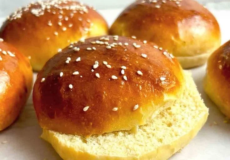 Fluffy homemade burger buns fresh out of the oven