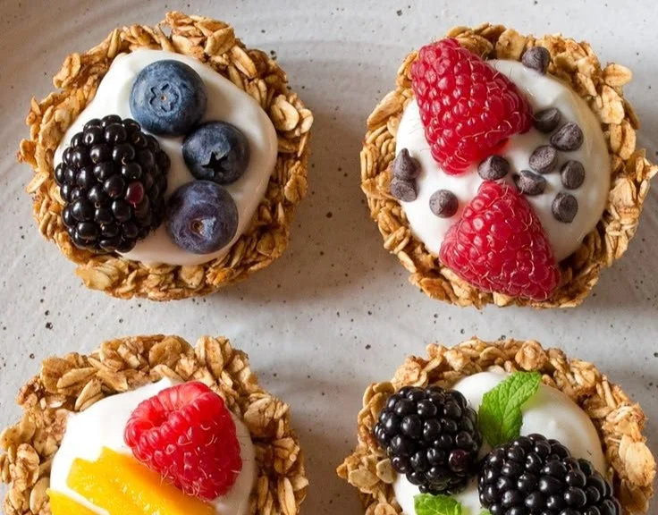 Healthy breakfast granola cups filled with nuts and fruits for a nutritious meal