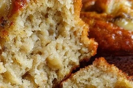 Healthy Greek yogurt banana muffins cooling on a wire rack