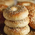 Homemade sourdough bagels fresh out of the oven, golden and delicious.