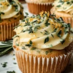 Delicious lemon thyme rosemary cupcakes with floral and citrus notes.