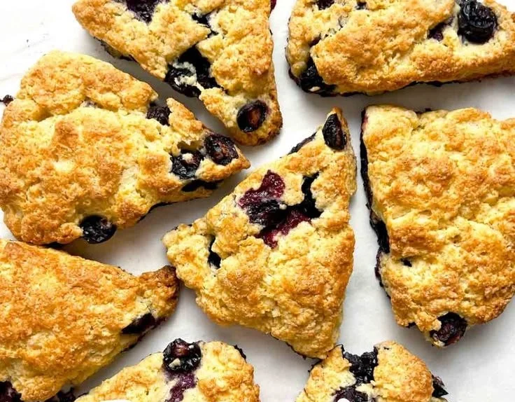Delicious freshly baked scones on a cooling rack