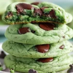 Freshly baked Mint Chocolate Chip Cookies on a cooling rack
