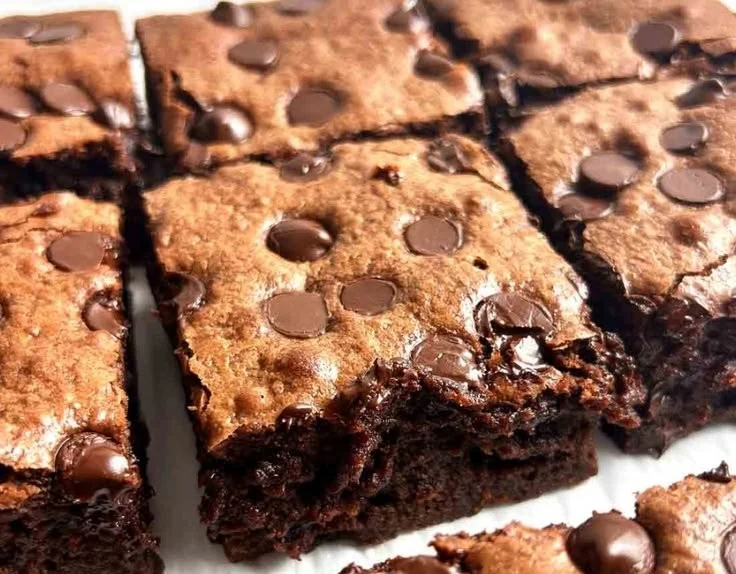 Delicious sourdough brownies served on a white plate.