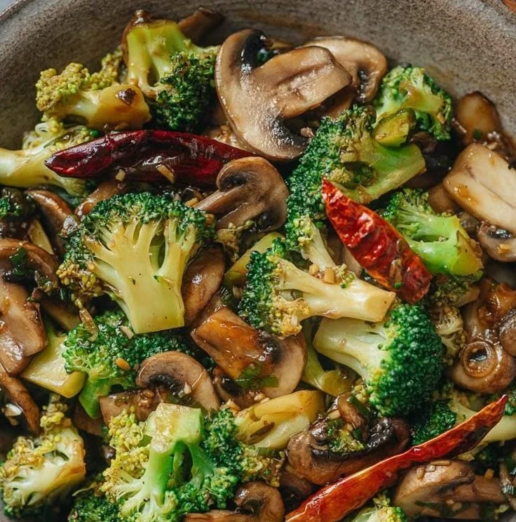 Delicious stir-fried broccoli and mushrooms dish served in a bowl
