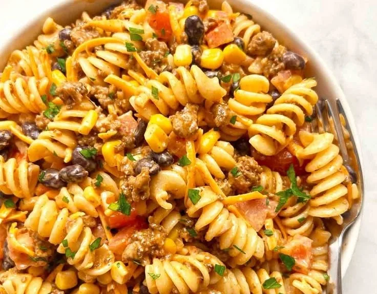 Colorful Taco-Seasoned Pasta Salad served in a bowl with fresh ingredients