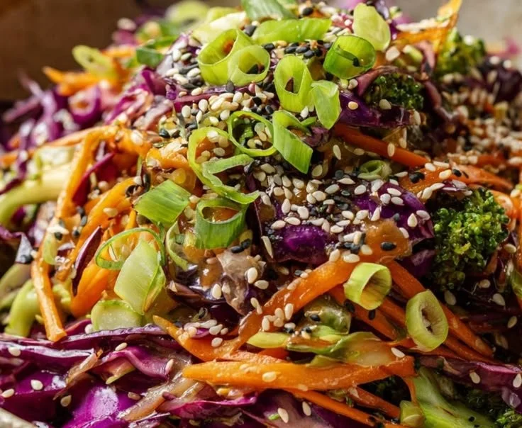 Vibrant Asian Cabbage Salad with sesame ginger dressing in a bowl