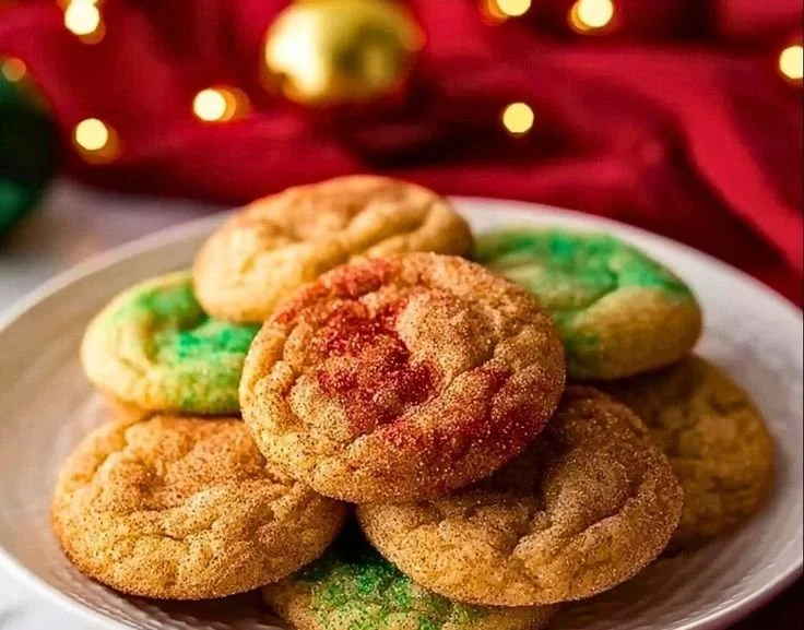 Batch of chewy Christmas Snickerdoodles on a festive plate