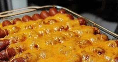 Delicious chili cheese dogs topped with savory chili and melted cheese