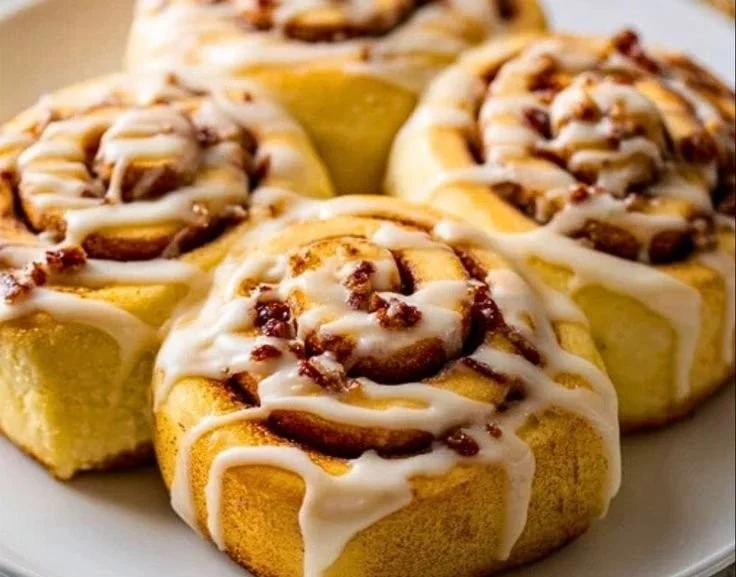 Delicious homemade eggnog cinnamon rolls with festive frosting