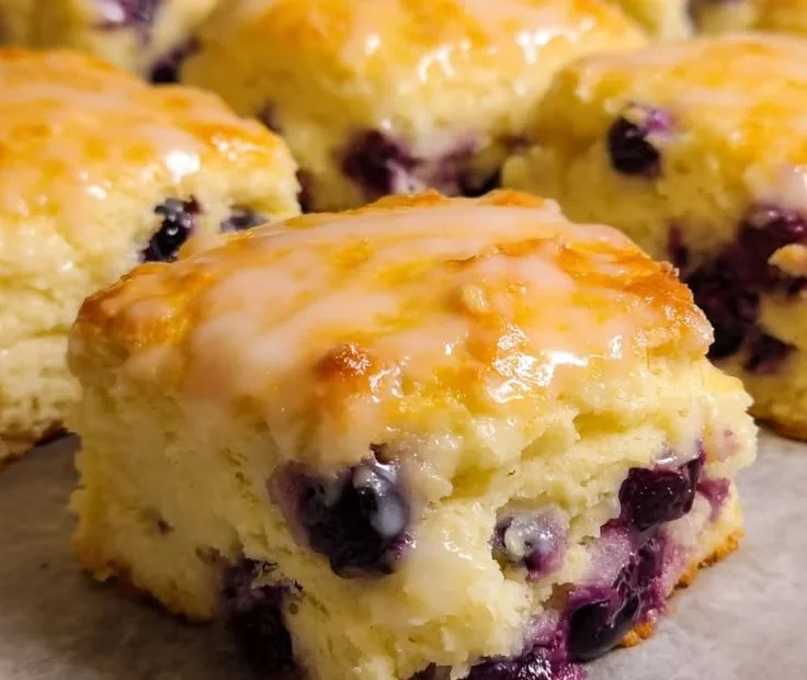 Freshly baked lemon blueberry biscuits with a golden crust