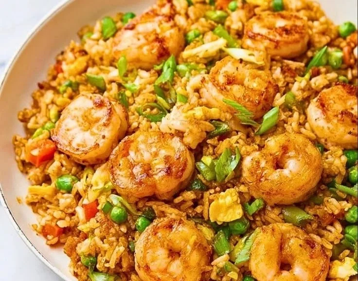 Delicious one-skillet shrimp fried rice prepared with fresh ingredients.