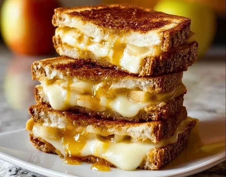 Smoked gouda apple grilled cheese sandwich with crispy bread and melted cheese