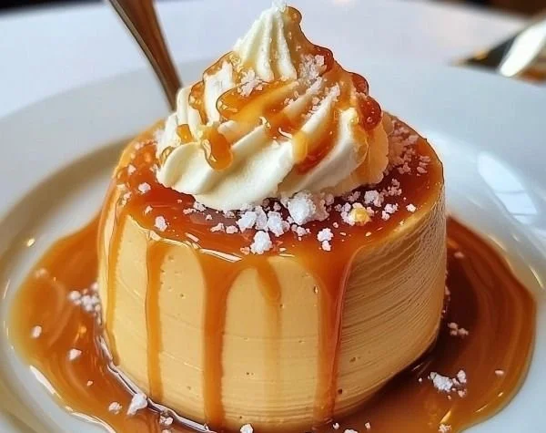 Delicious bowl of homemade salted caramel mousse topped with a sprinkle of sea salt